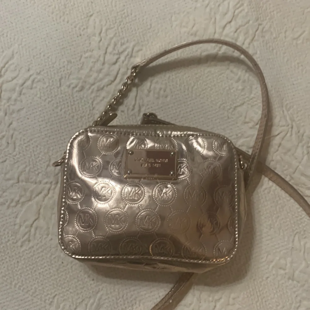 Michael Kors, gold embossed Crossbody